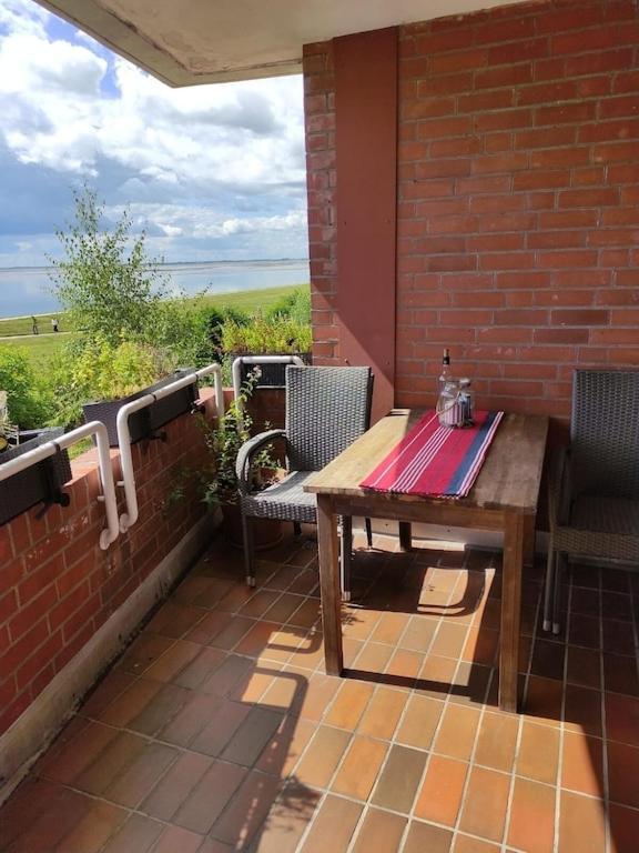 Schoenes Feriendomizil Mit Meerblick Suedstrand Naehe Fliegerdeich In Apartment